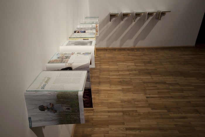 Detail from Acts of Refusal in Tartu Artists Association House, 2011. Rubén Grilo, Untitled (Waiting for Title, Estonian Magazines), 2011. Several Estonian Magazines, shelves, glass, dimentions variable.