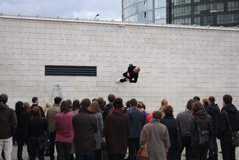 Walking on the Wall (2012) — a performative lecture on design choreography by Julijonas Urbonas, delivered in 2012 on the façade of the National Art Gallery, Vilnius, Lithuania. © Ernestas Parulskis / Julijonas Urbonas