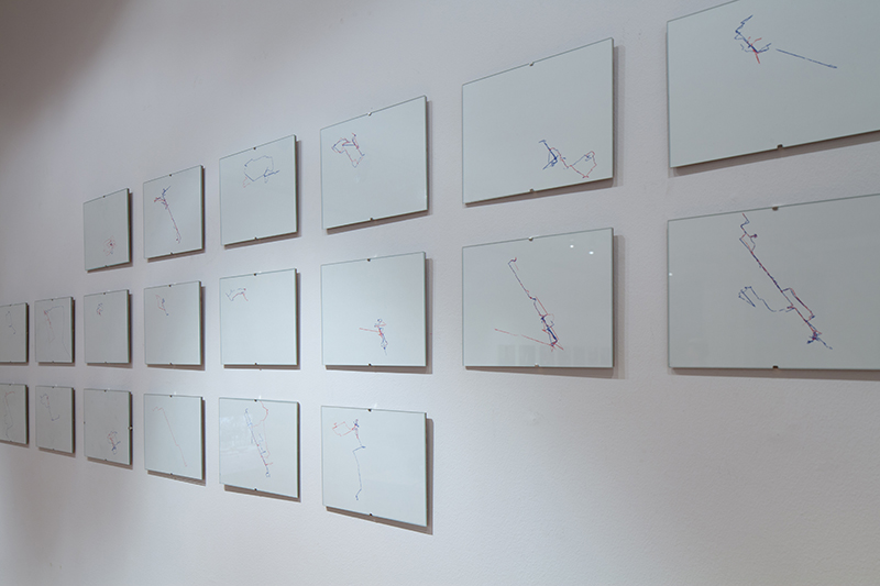Petra Köhle & Nicolas Vermot Petit-Outhenin - There where I should have been yesterday. I am here today, 2006-12. Simultaneous lecture. Performative setting with slide projection, texts, prints, table, chairs