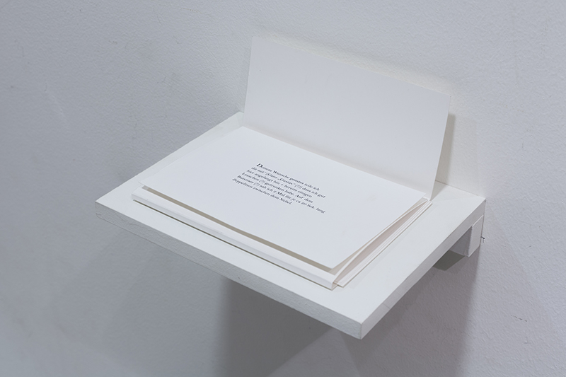 Laura Stasiulytė - In “Letters”, 2013-14. 4 b/w photographs, 1 colour photograph, collection of postcards, video, text