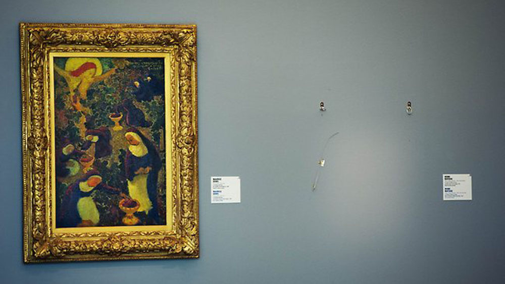 Tuščia vieta ant sienos, kur kabėjo Henry Matisse „La Liseuse en Blanc et Jaune“ (liet. Skaitytoja geltoname ir baltame) prieš jam dingstant.