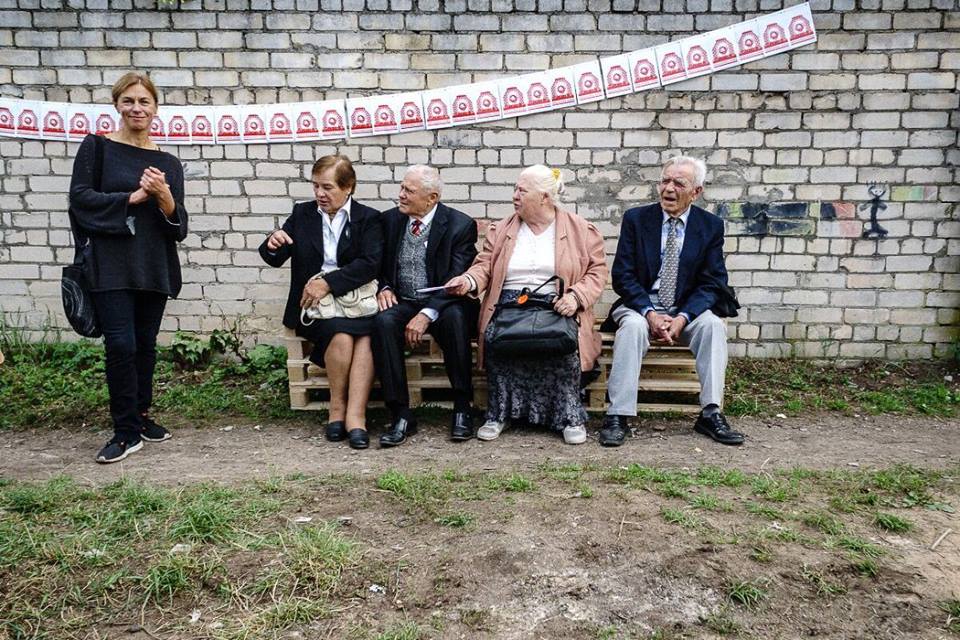 Vita Gelūnienė and local on the opening of Friendly Zone #6 – Cabbage Field, a Site Specific Land Reclamation Project as part of Kaunas Biennial 2015 . Photo: Remigijus Ščerbauskas